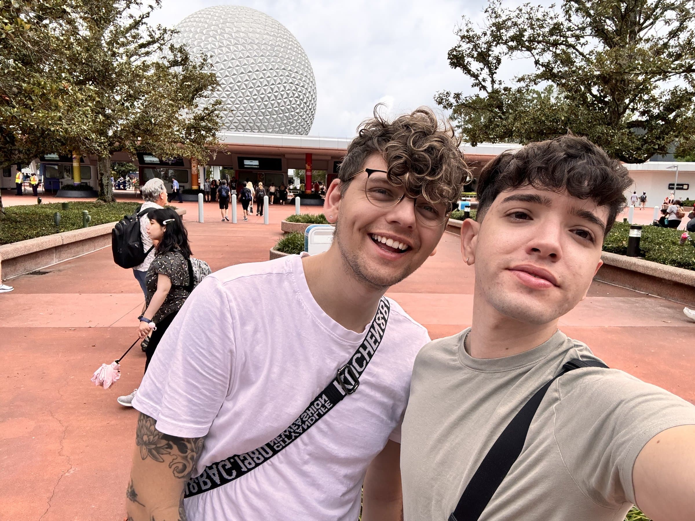 At Epcot with the iconic Spaceship Earth globe in the background