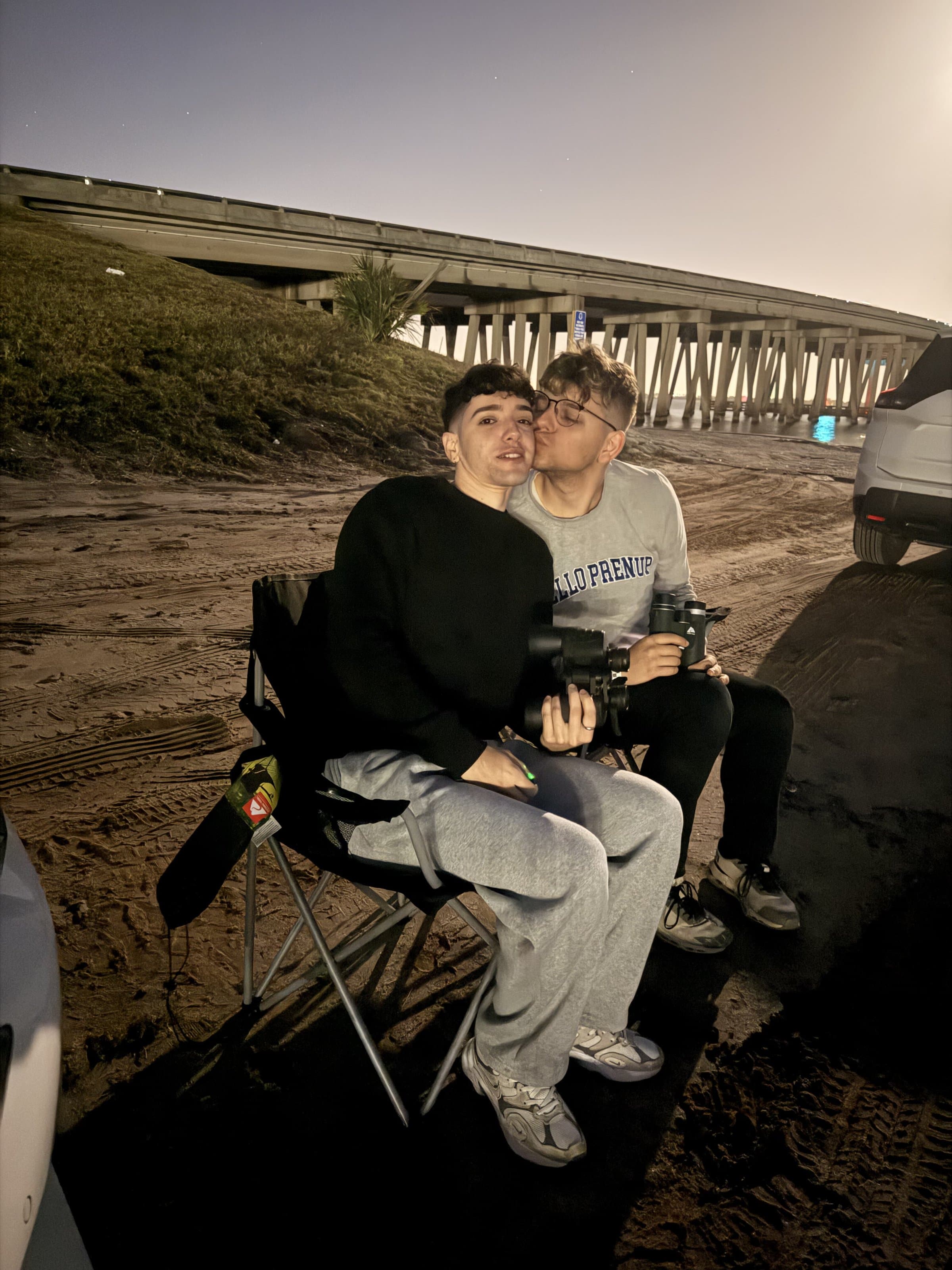Watching a rocket launch at night from camp chairs on the Space Coast